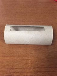 toilet paper roll with cutout