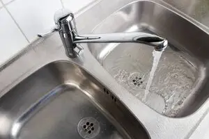 Water Running into Kitchen Sink