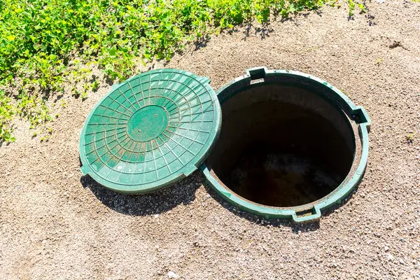Septic tank in ground possibly in need of a plumber in Spokane