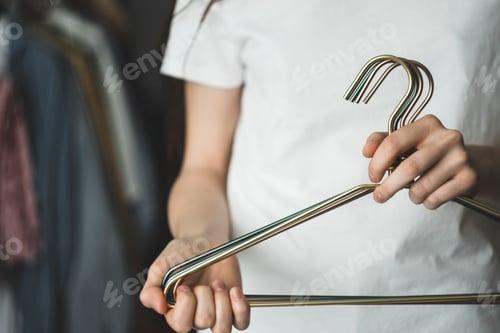 You can use metal coat hangers to unclog a toilet by pushing the debris through the pipes.