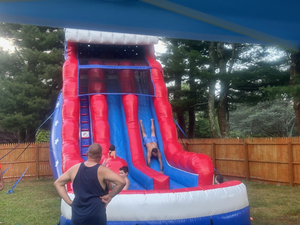 2024 Employee Appreciation Party, even the grownups love the slide