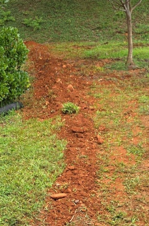 Installing a new Tankless Water Heater. Trenching in a new line from the meter.