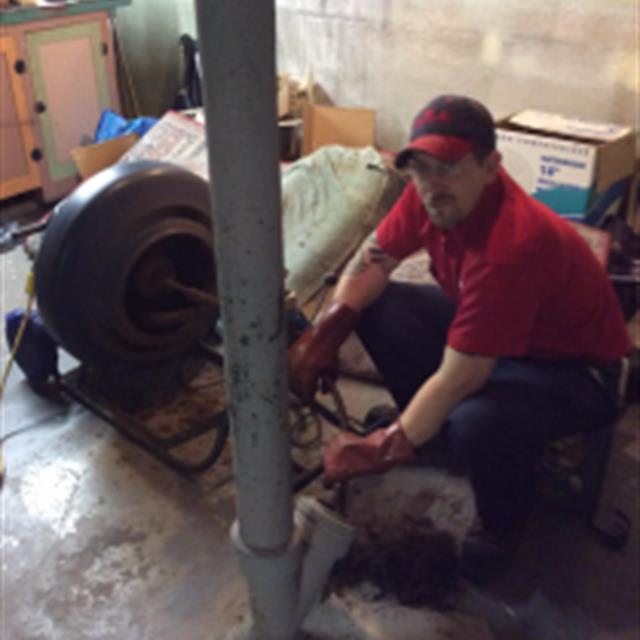 MRR tech working on plumbing.