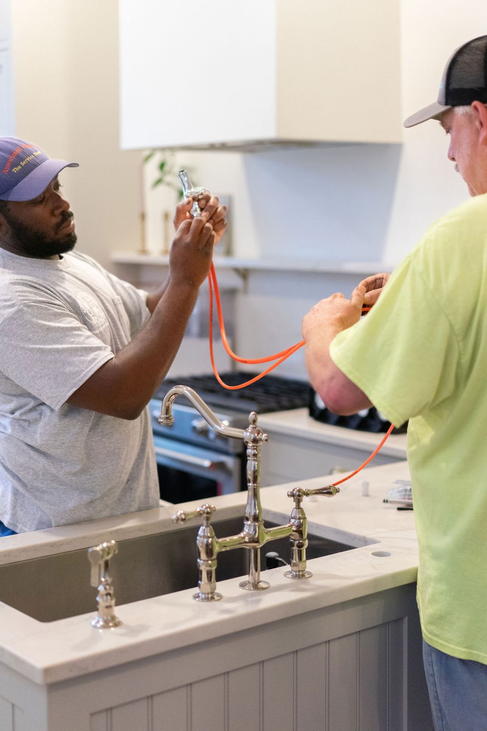 Mr. Rooter Plumbing installing reverse osmosis