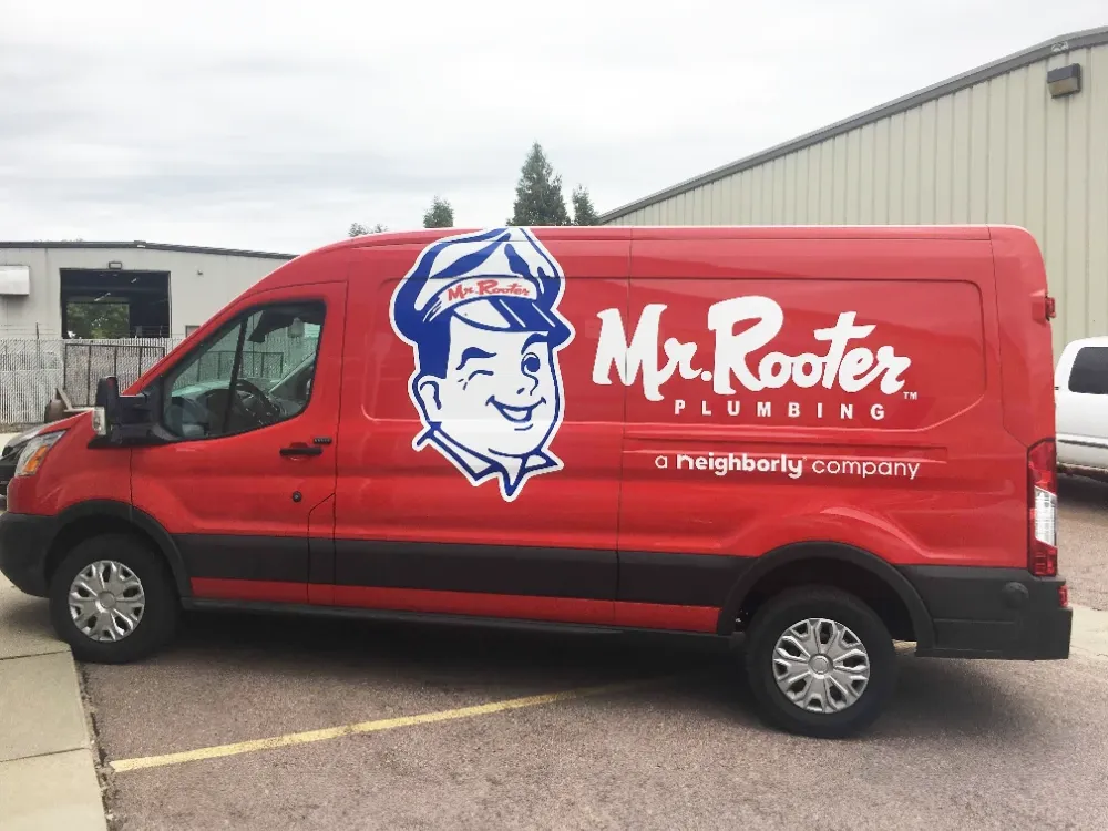 Red Van with Mr. Rooter Logo