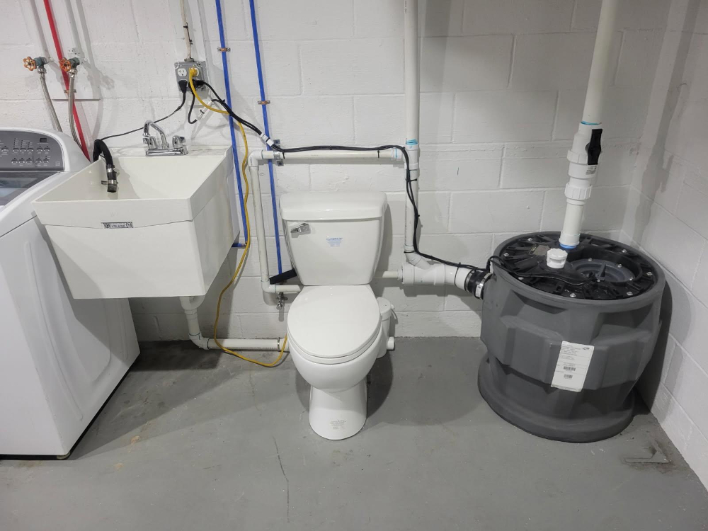 sink, toilet, grinder pump