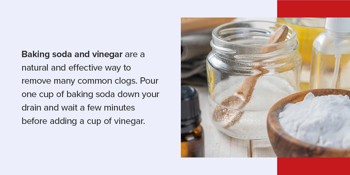 baking soda in a pestle and vinegar in a glass jar.