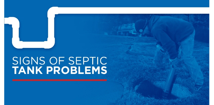 Plumber working on septic system with text: Signs of septic tank problems