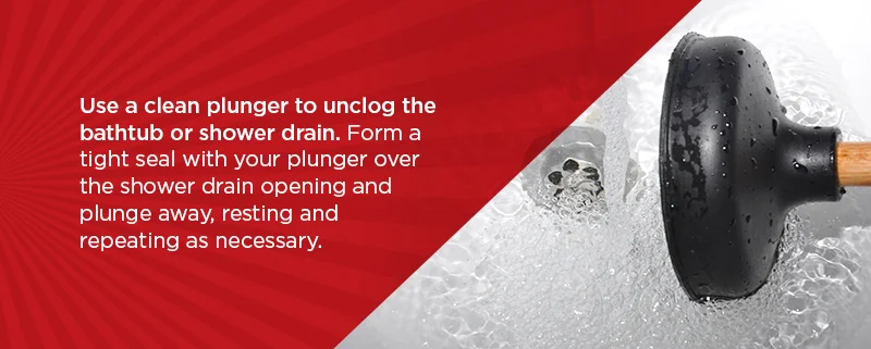 Using a plunger to unclog shower or bathtub drain