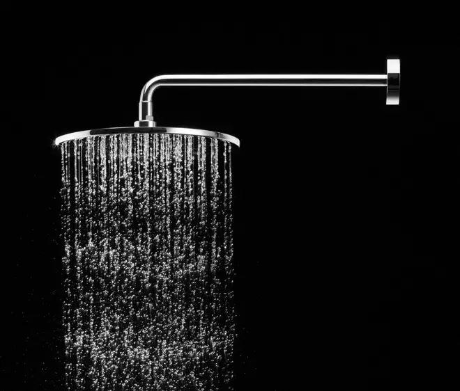 An overhead shower faucet with AeroJet technology by TOTO.