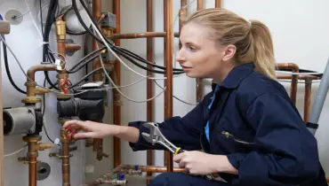 Hiring a plumber.
