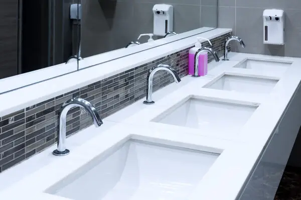 Row of sinks in need of Knoxville commercial plumbing