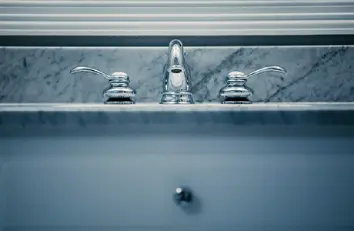 Faucet fixture in a bathroom