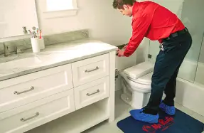 Mr. Rooter plumber providing Wilmington toilet repair