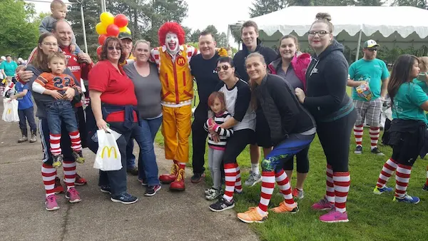Mr. Rooter Plumbing team posing with Ronald McDonald at the 2016 RMHC Stronger Together 5K Walk.